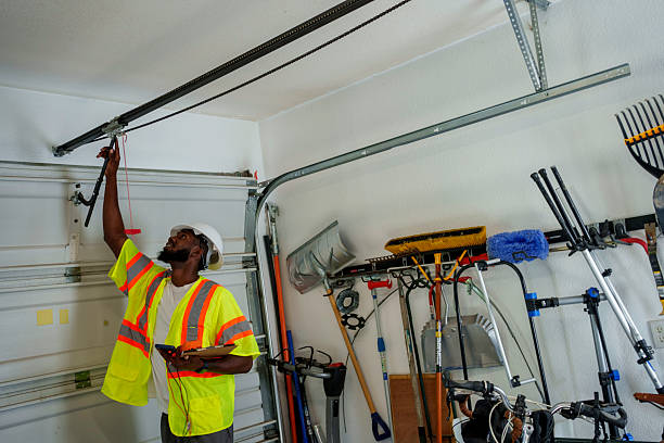 Professional Garage Door Panel Replacement technician working in Eaton Rapids, MI